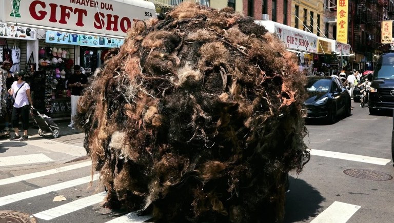Giant Tumblehair hairball in a Chinatown intersection in New York City