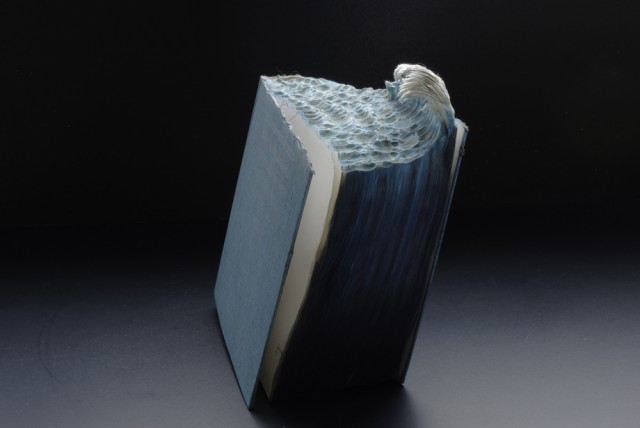 Carved book landscape sculptures by Guy Laramee