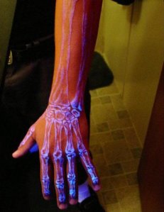 Ultraviolet skeletal tattoo