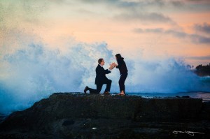 Wedding proposal at beach interrupted by giant wave