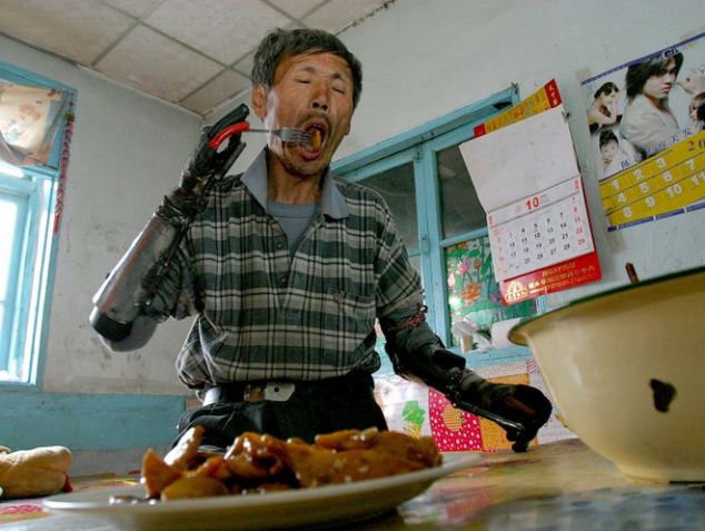 Chinese man builds his own prosthetic arms