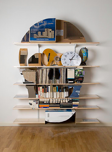 Skull bookshelf sculptures by James Hopkins