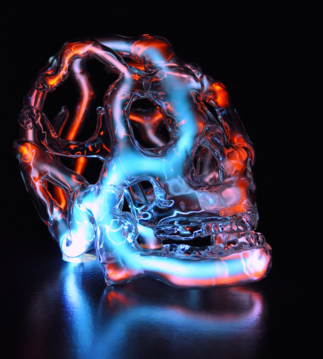 Luminous glass skulls by Eric Franklin