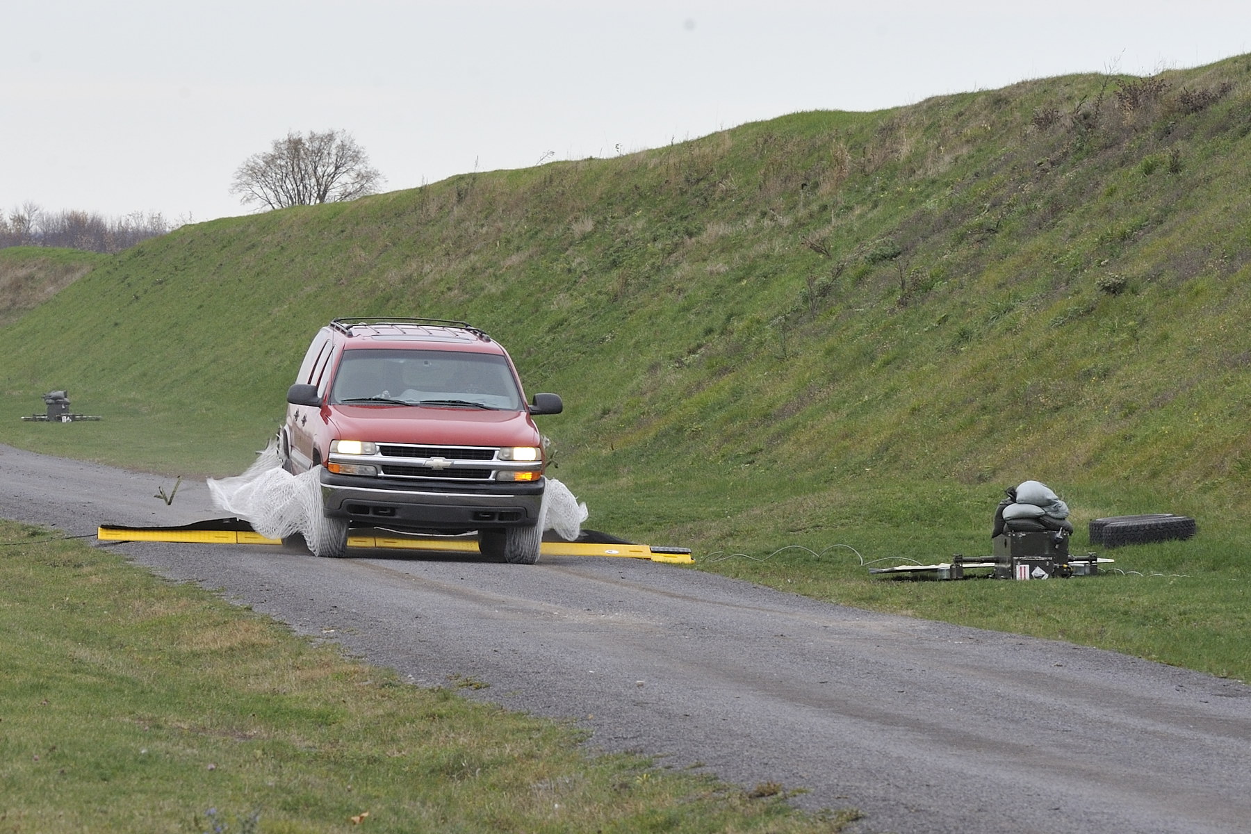 SQUID Car Stopper Safe Quick Undercarriage Immobilization Device