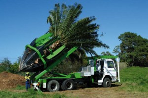 Truck mounted tree spade transplantation